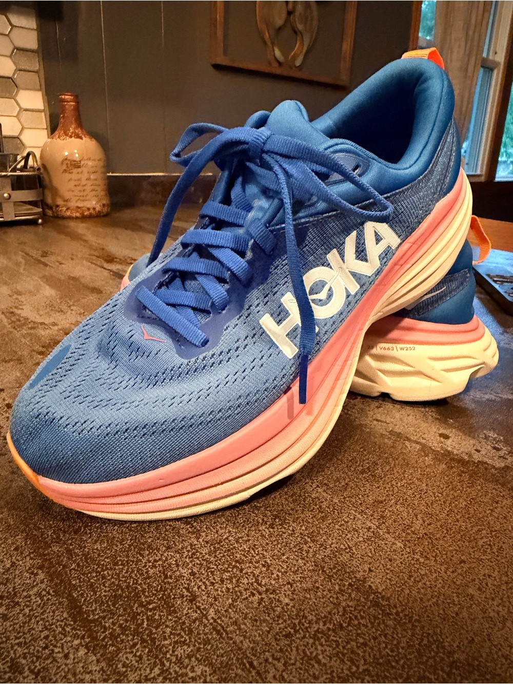 HOKA women’s Blue and Pink Bondi-Style Running Shoes